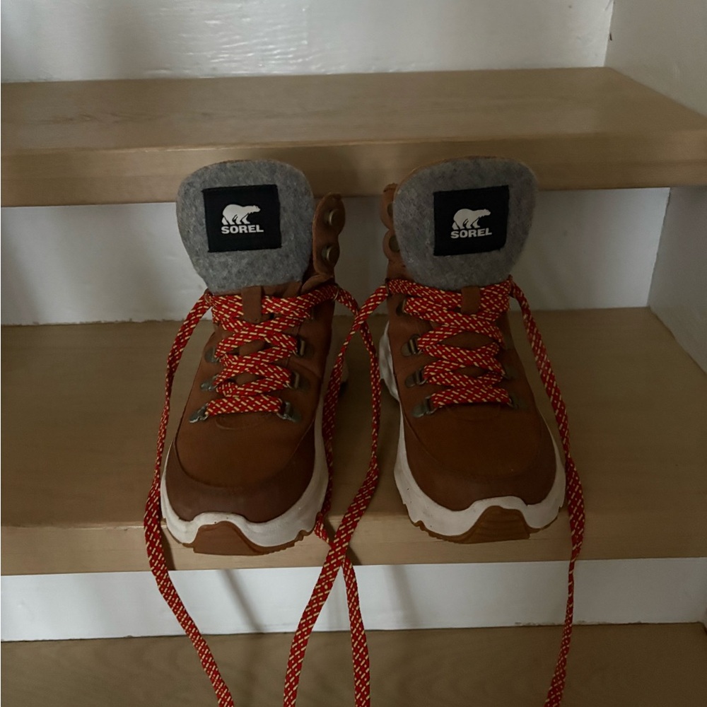 Sorel women’s Tan Boots with Red Laces